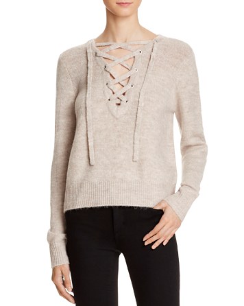 These Are The Trending Sweater Styles College Students Are Wearing 21 lace-up-sweater