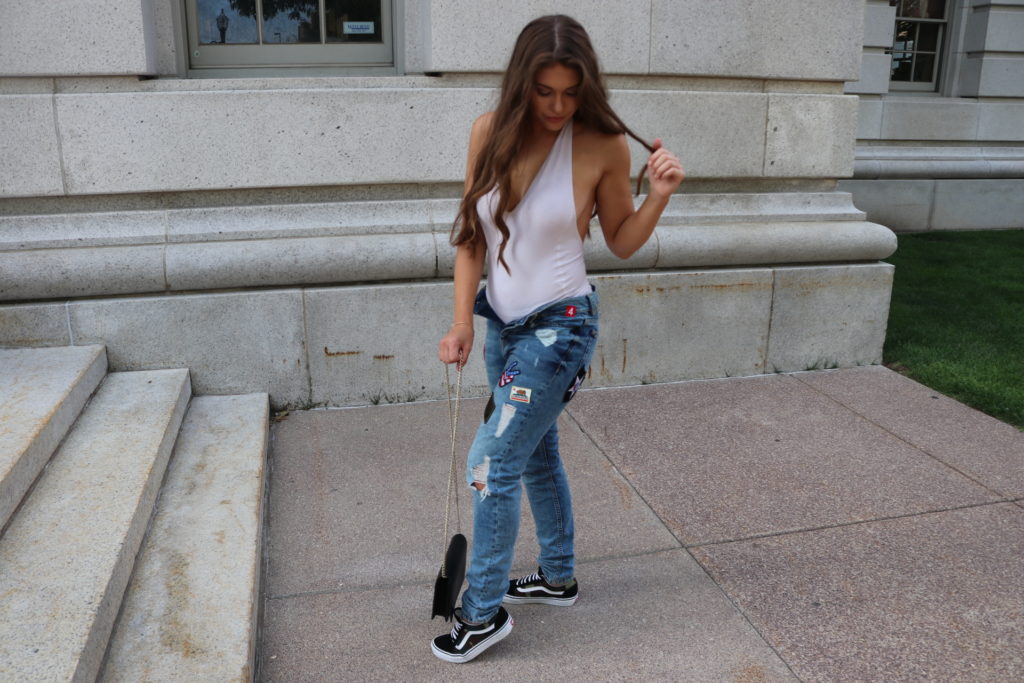 Frontal View of Patched Boyfriend Jeans Styled