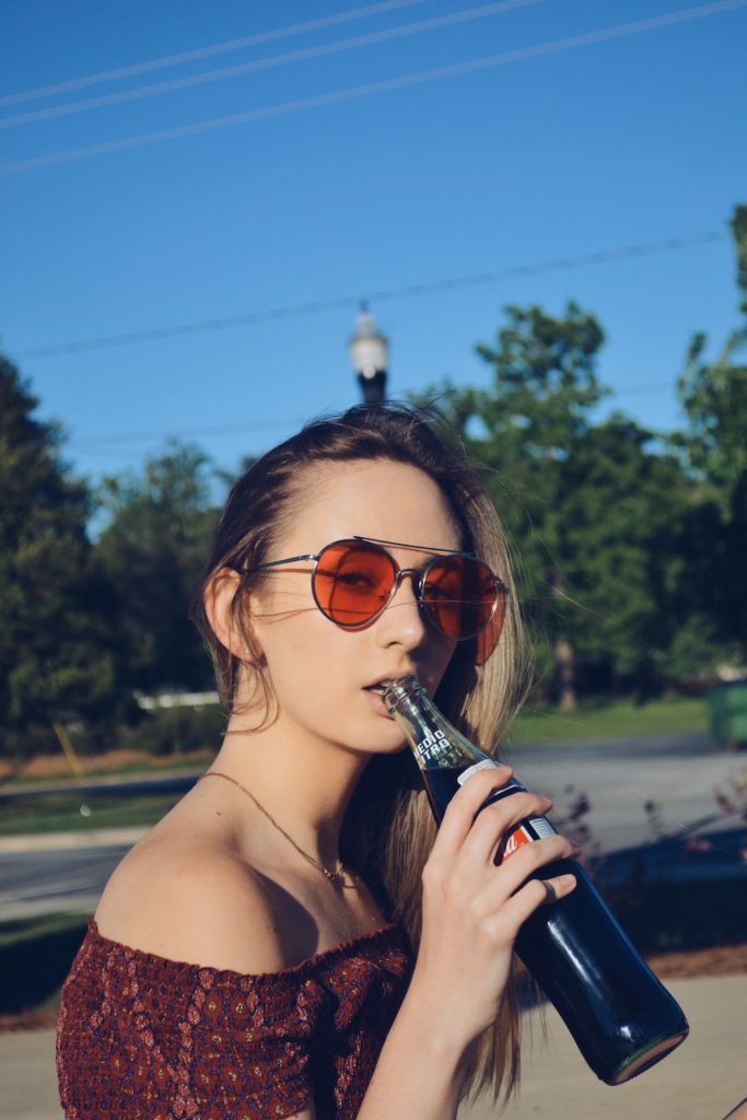 Red Colored Sunglasses on Girl