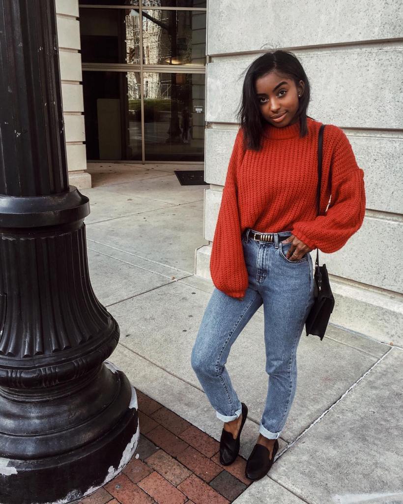 red sweater and jeans