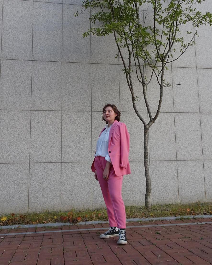 Pink Suit Travel Outfit