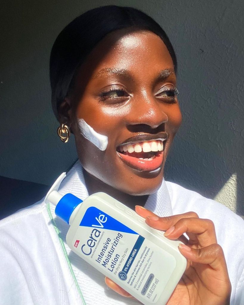 CeraVersity Ambassador posing with CeraVe products